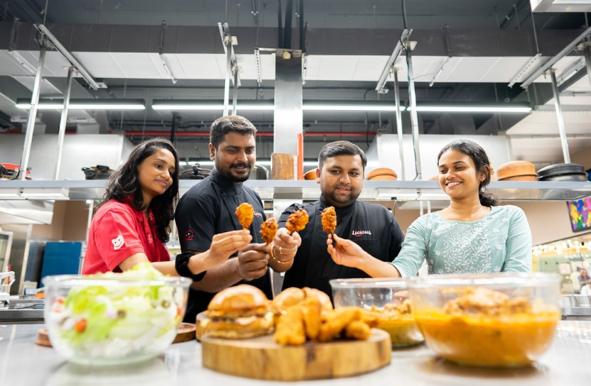 Licians in the kitchen holding food